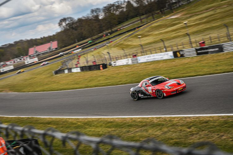 Porsche model racing on a track