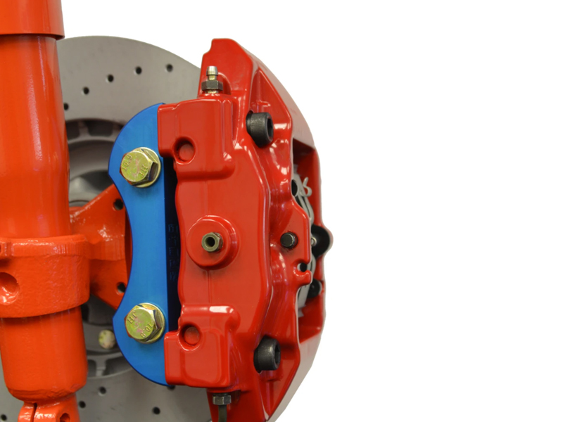 Stomski Racing SR046 Front brake caliper adapter for Porsche 911 8489