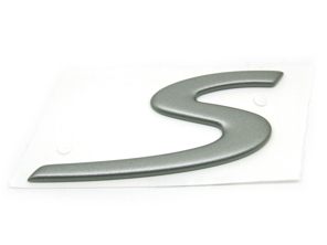 S - Badge, in Titanium metallic. Porsche 986 Boxster S - 98655924301, 986559243009A4, 986.559.243.01, 986.559.243.00.9A4